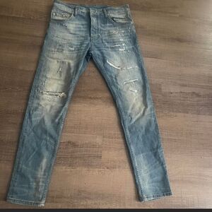 Gucci Light Wash Distressed Slim Straight Jeans